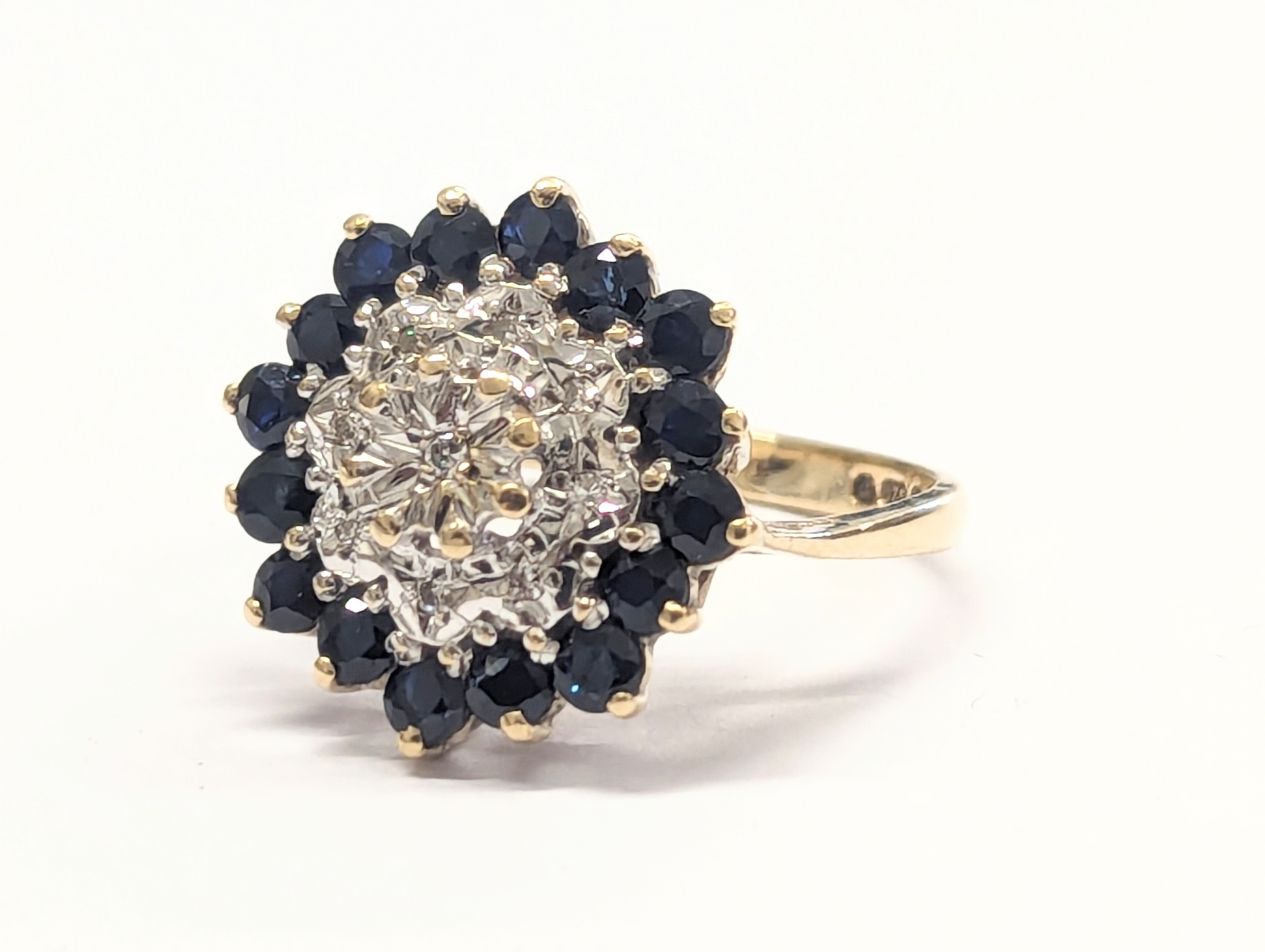 A 9ct gold, diamond and sapphire ring. 3.88g. Size UK K 1/2. - Image 2 of 4