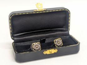 A pair of vintage Tiffany & Co 18ct gold and silver earrings.