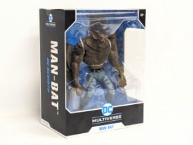 A DC Multiverse figure of Man-Bat, DC Rebirth. Box measures 23x30cm