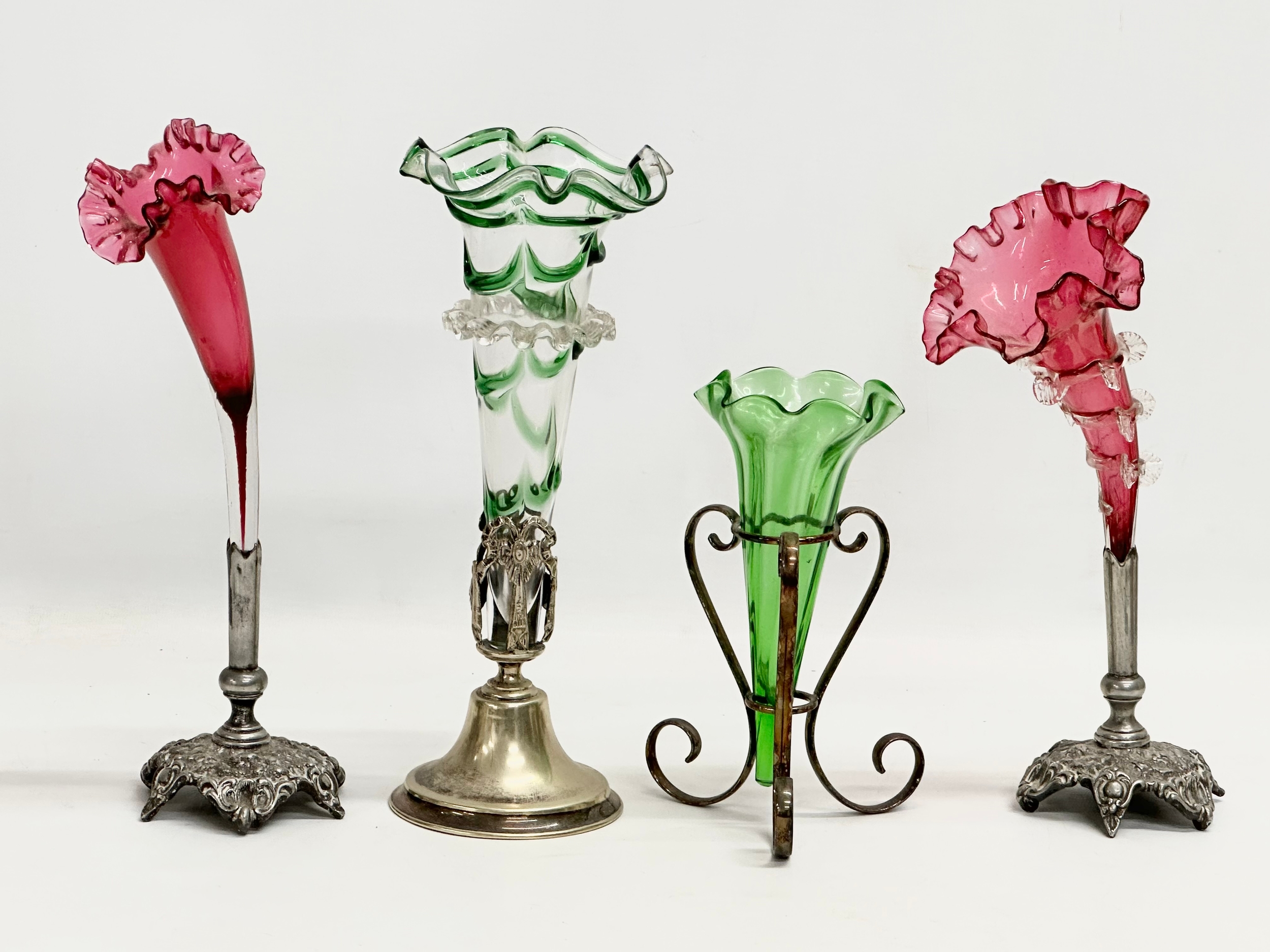 4 Late 19th Century glass epergne vases on silver plated stands. A good quality green frilled rim