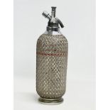 A 1930’s wire mesh soda syphon’s. 35cm