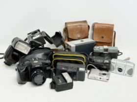 A collection of vintage cameras.