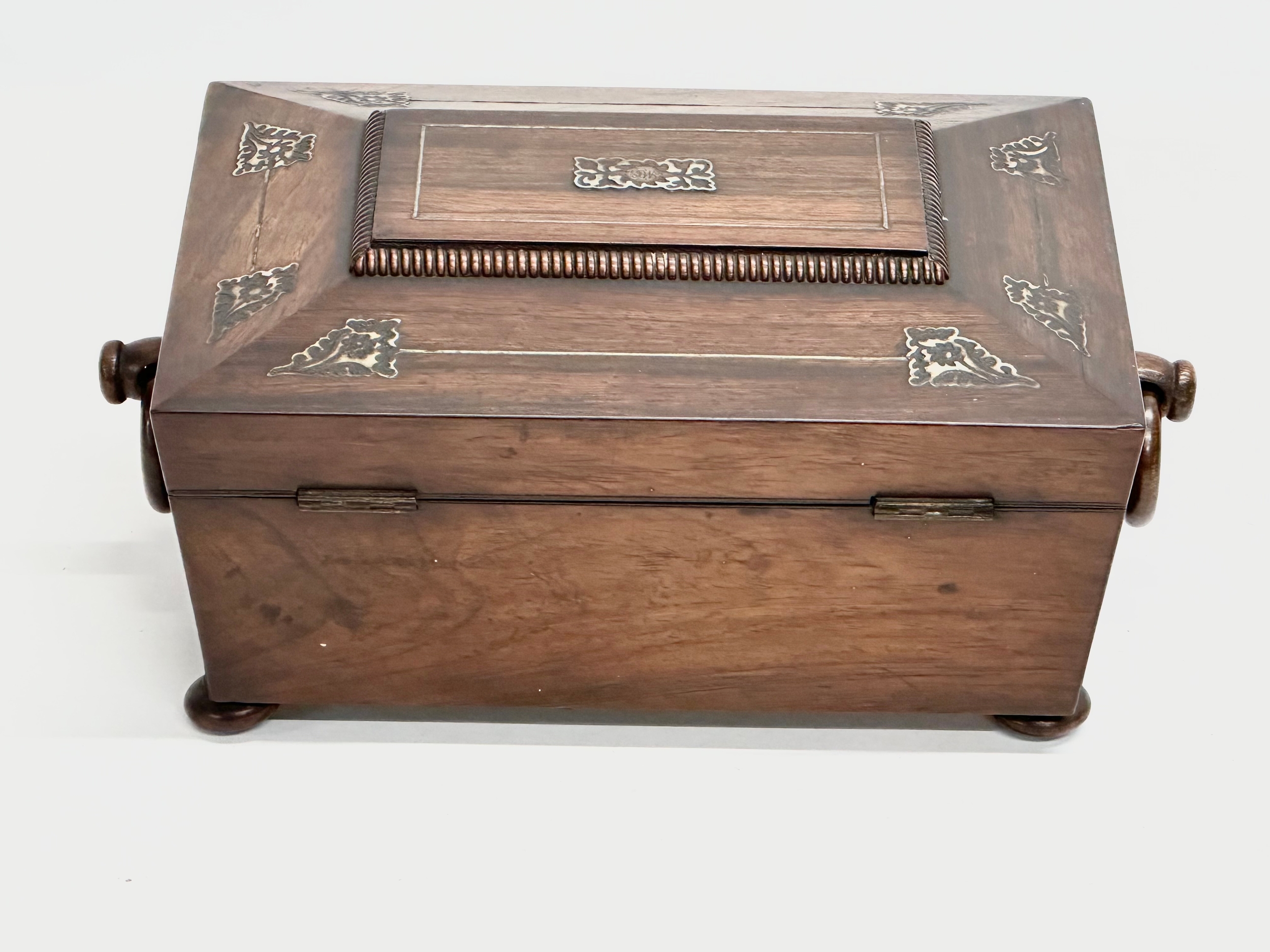 A Regency rosewood and Mother of Pearl sarcophagus shaped sewing box. Early 19th Century. Circa - Image 7 of 7