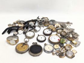 A quantity of vintage watches, pocket watches, watch parts, etc