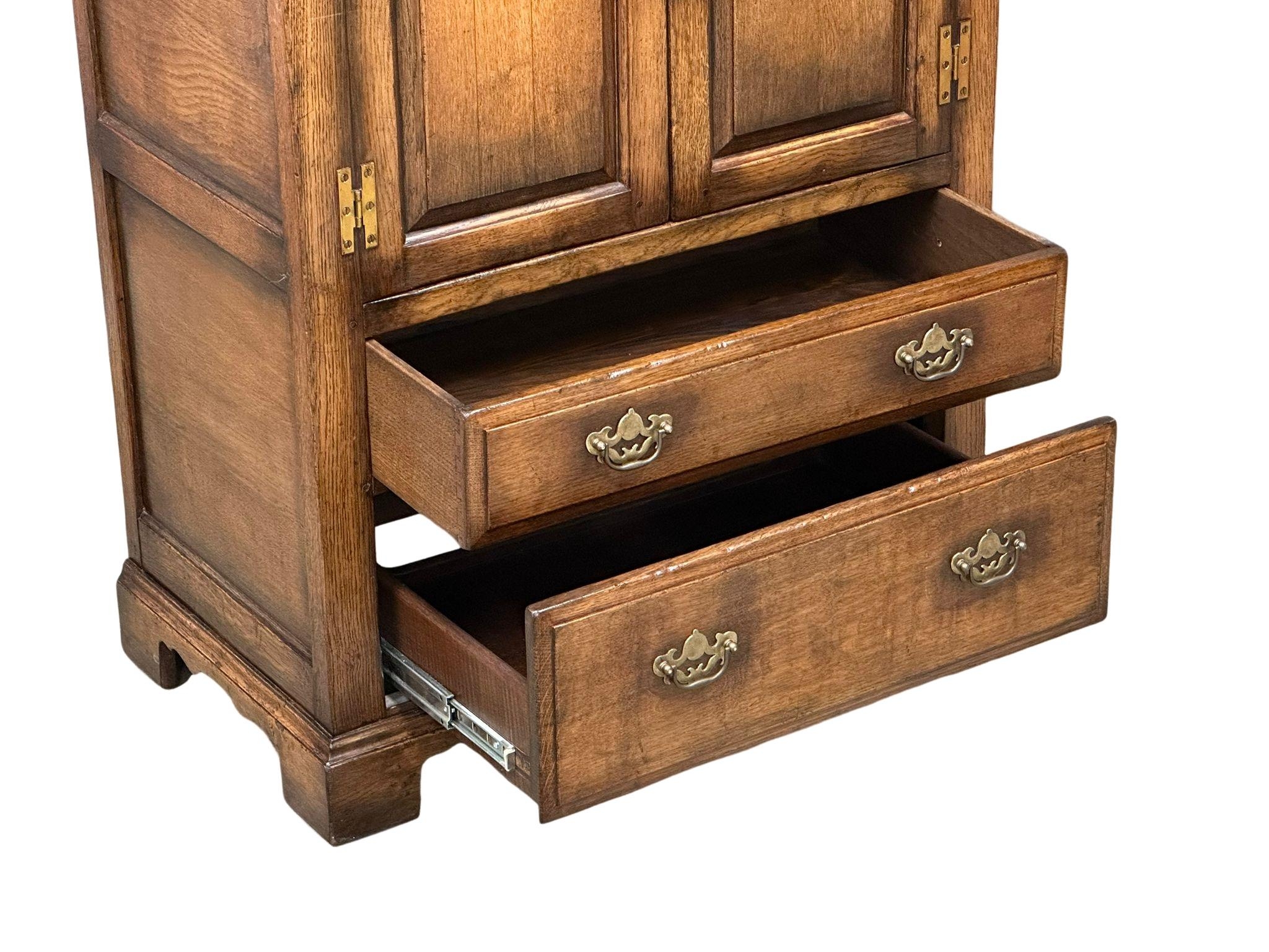 A George III style Ipswich oak side cabinet. 81x47x103cm - Image 4 of 4