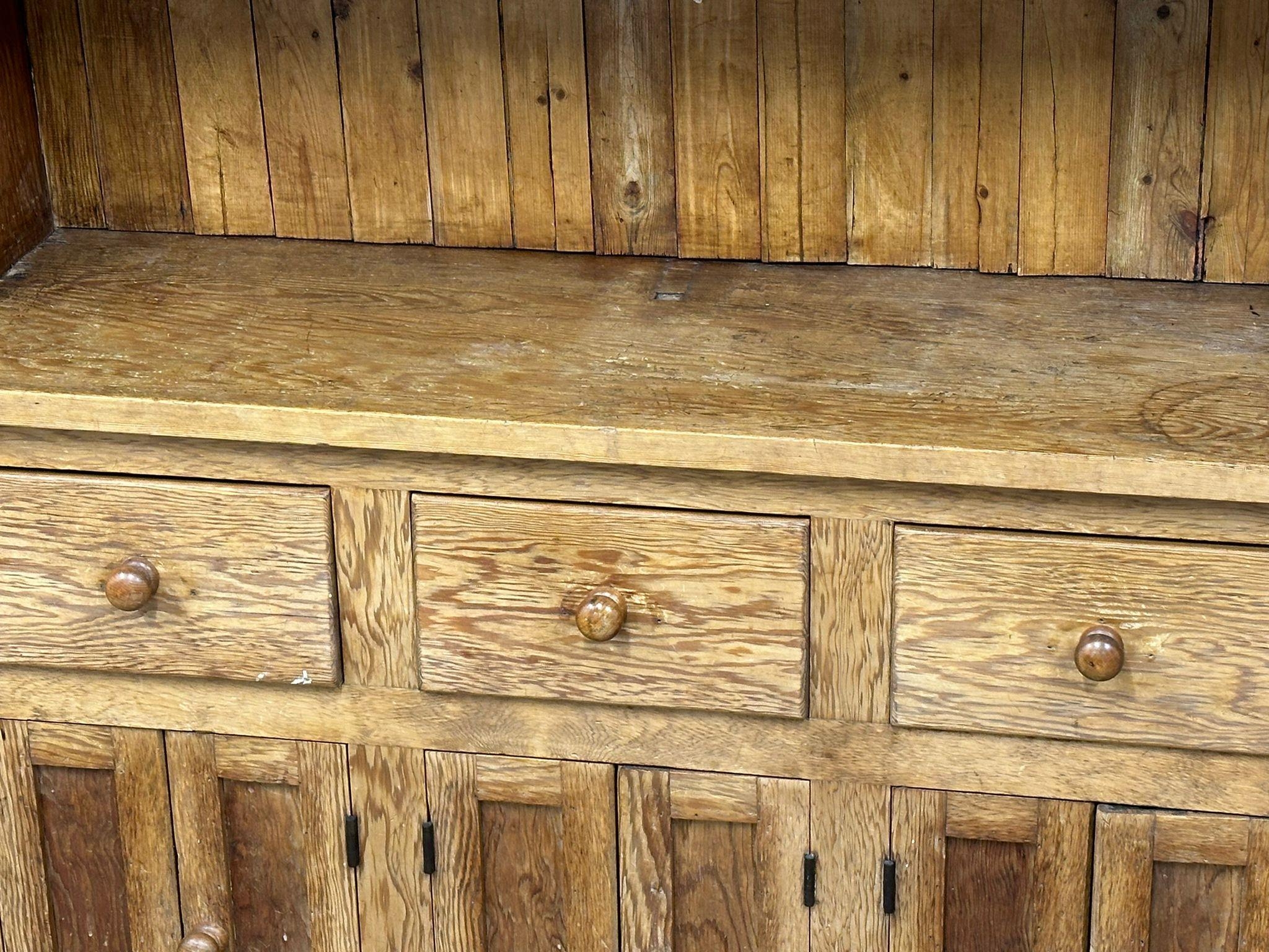 A large Late 19th Century Victorian pine kitchen dresser. 144x48x221cm - Image 3 of 8