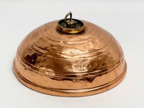 A Wafax copper bed warmer. 21x10cm