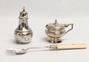 A quantity of early 20th century silver items including a silver mounted fork, etc. Sheffield, 1900.