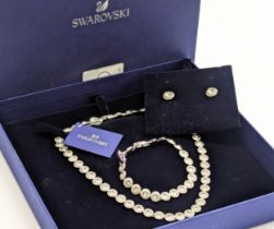 A Swarovski Crystal necklace, bracelet and earrings set.