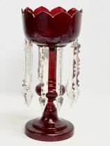 A large Victorian Ruby Glass lustre with cut glass droplets. 16x35cm