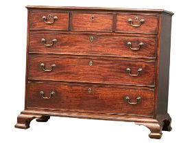 A good quality George III mahogany chest of drawers with original brass drop handles on Ogee feet.