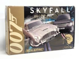 A Scalextric James Bond Skyfall 007 car and track set. Celebrating 50 Years of 007. Box measures