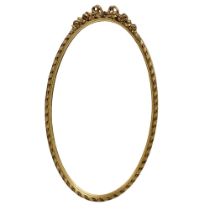 An oval gilt framed bevelled mirror. 44x76cm