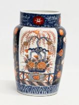 An Early 20th Century Imari pattern vase. With makers mark. 14x22cm