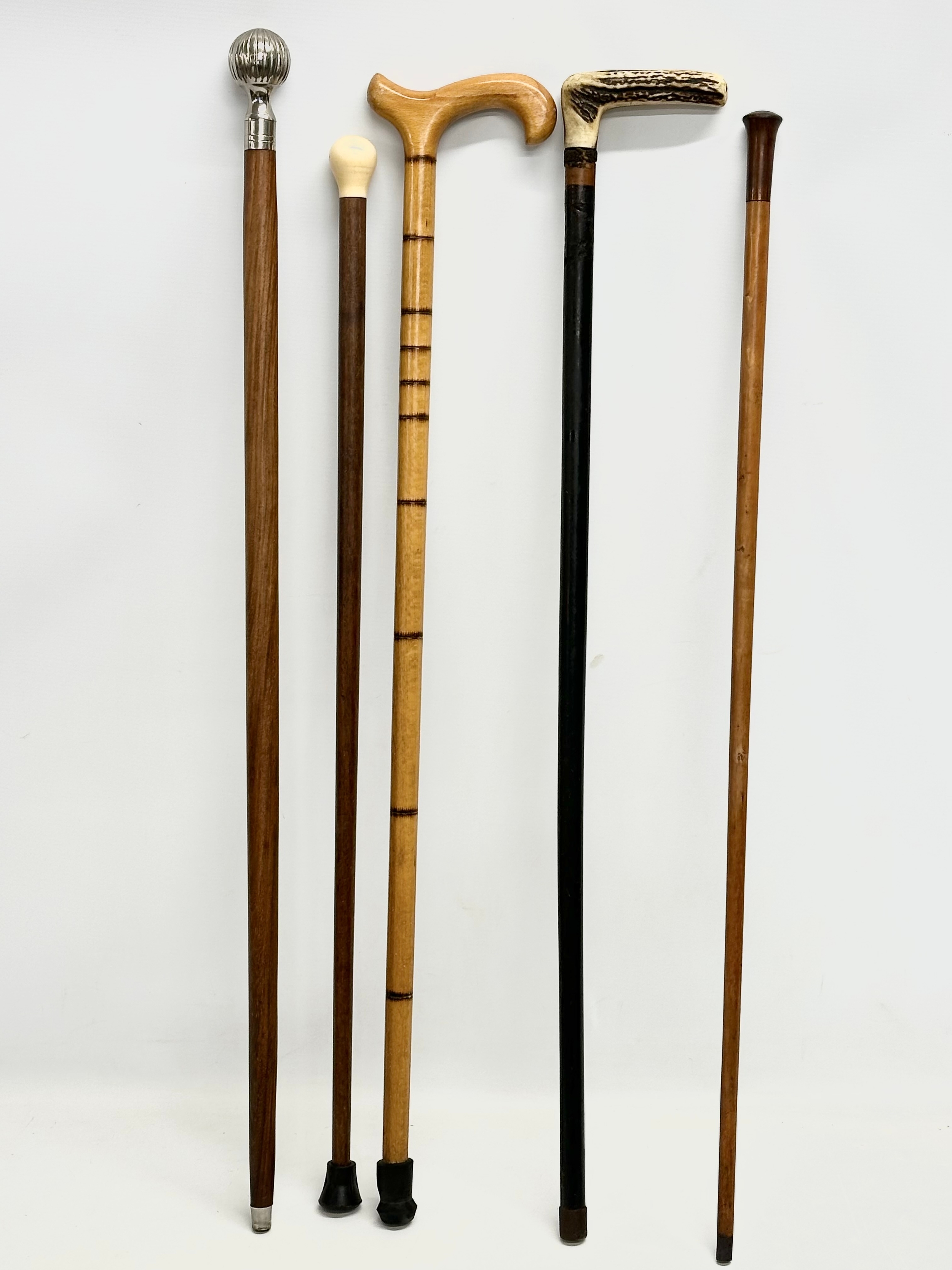 5 good quality vintage walking sticks. Largest 93cm