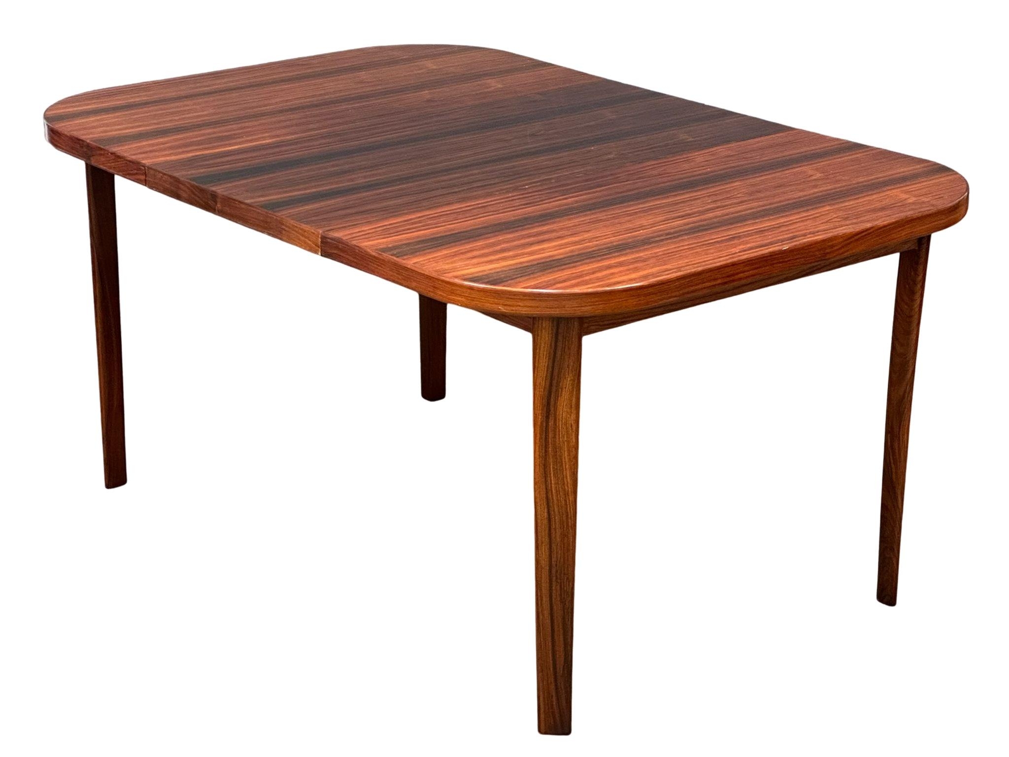 A Danish Mid Century rosewood extending dining table and 4 chairs. Closed 101x101x73cm. 1 leaf - Image 3 of 12