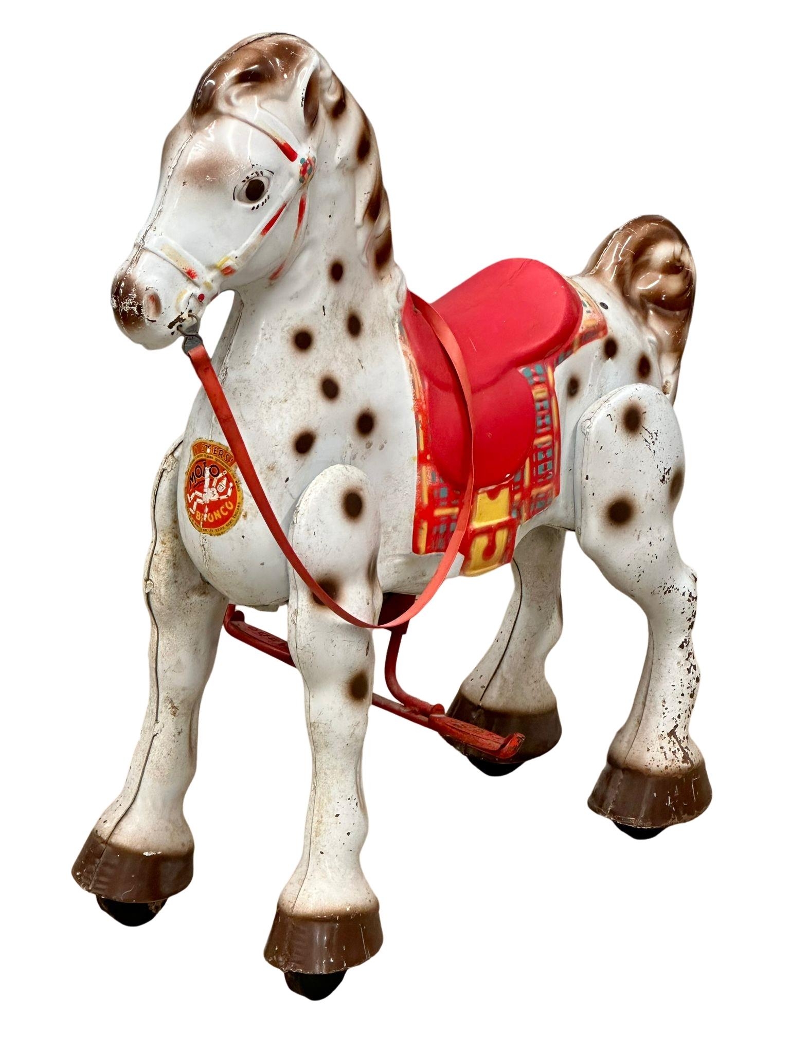 A 1950’s Mobo Bronco mechanical child’s horse.