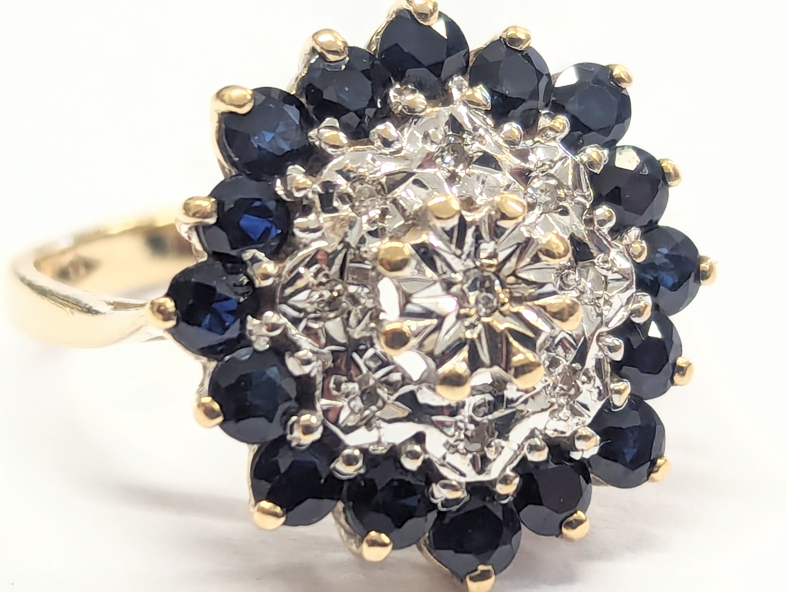 A 9ct gold, diamond and sapphire ring. 3.88g. Size UK K 1/2. - Image 4 of 4