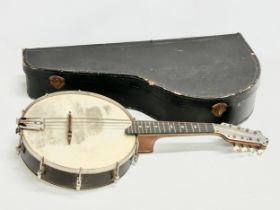 A good quality 8 string Banjolele with case. 62cm