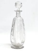 A 19th Century Victorian notch cut decanter and stopper. 29cm