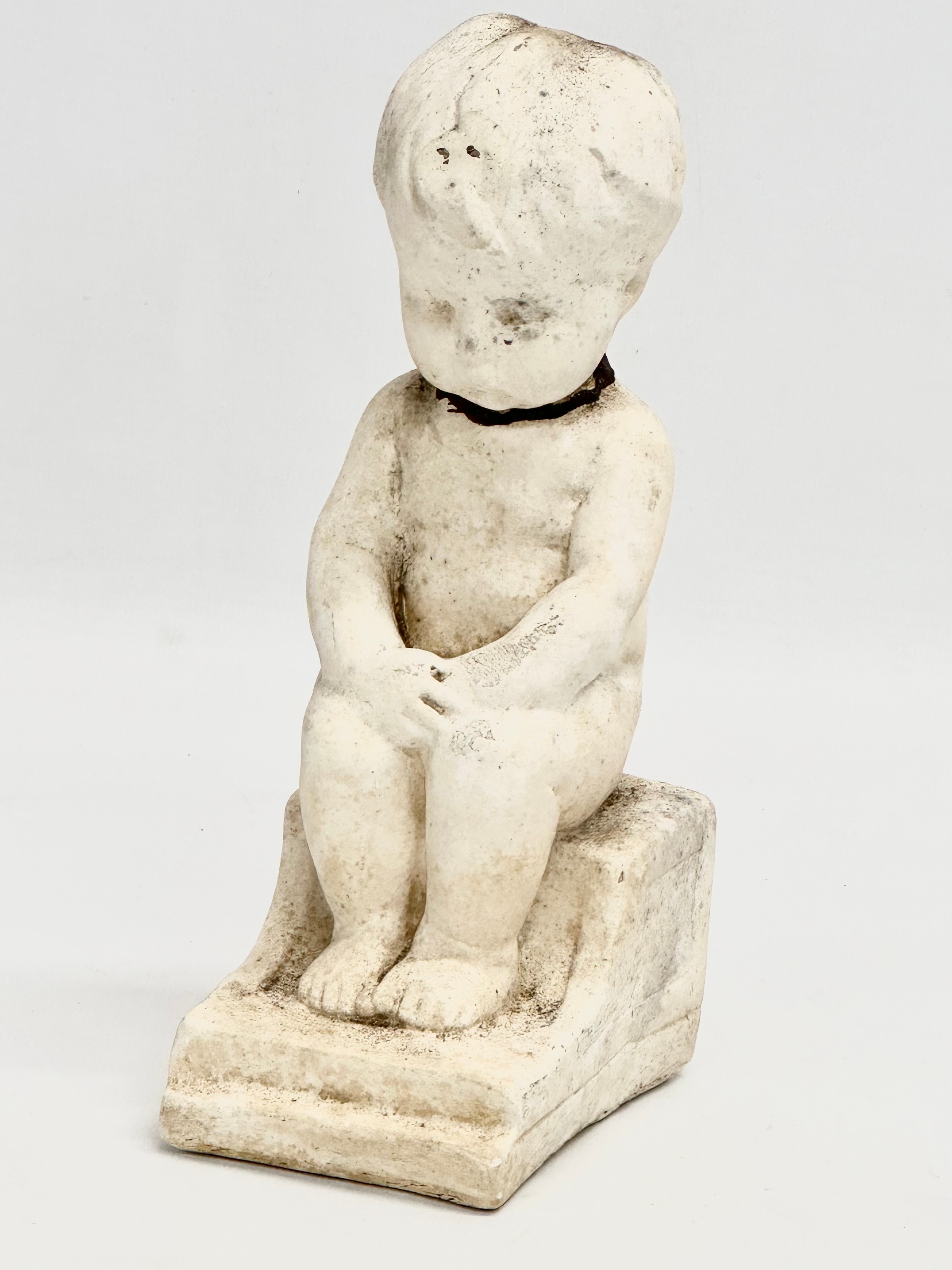 A Sophia Rosamond Praeger (1867-1954) ‘Philosopher’ figurine. 6.5x9x19.5cm