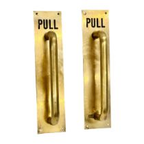 A pair of large vintage brass door pull handles. 30cm