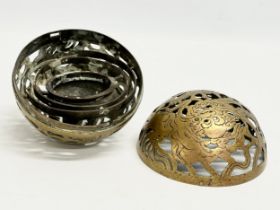 An Early 19th Century Chinese brass spherical incense burner/hand warmer/oil lamp. 12x12cm