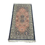 A Middle Eastern Keshan Super rug. 91x188cm
