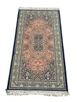 A Middle Eastern Keshan Super rug. 91x188cm