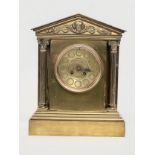 A large late 19th century French brass mantle clock by AD Mougin Deux Medailles. With pendulum. 28.
