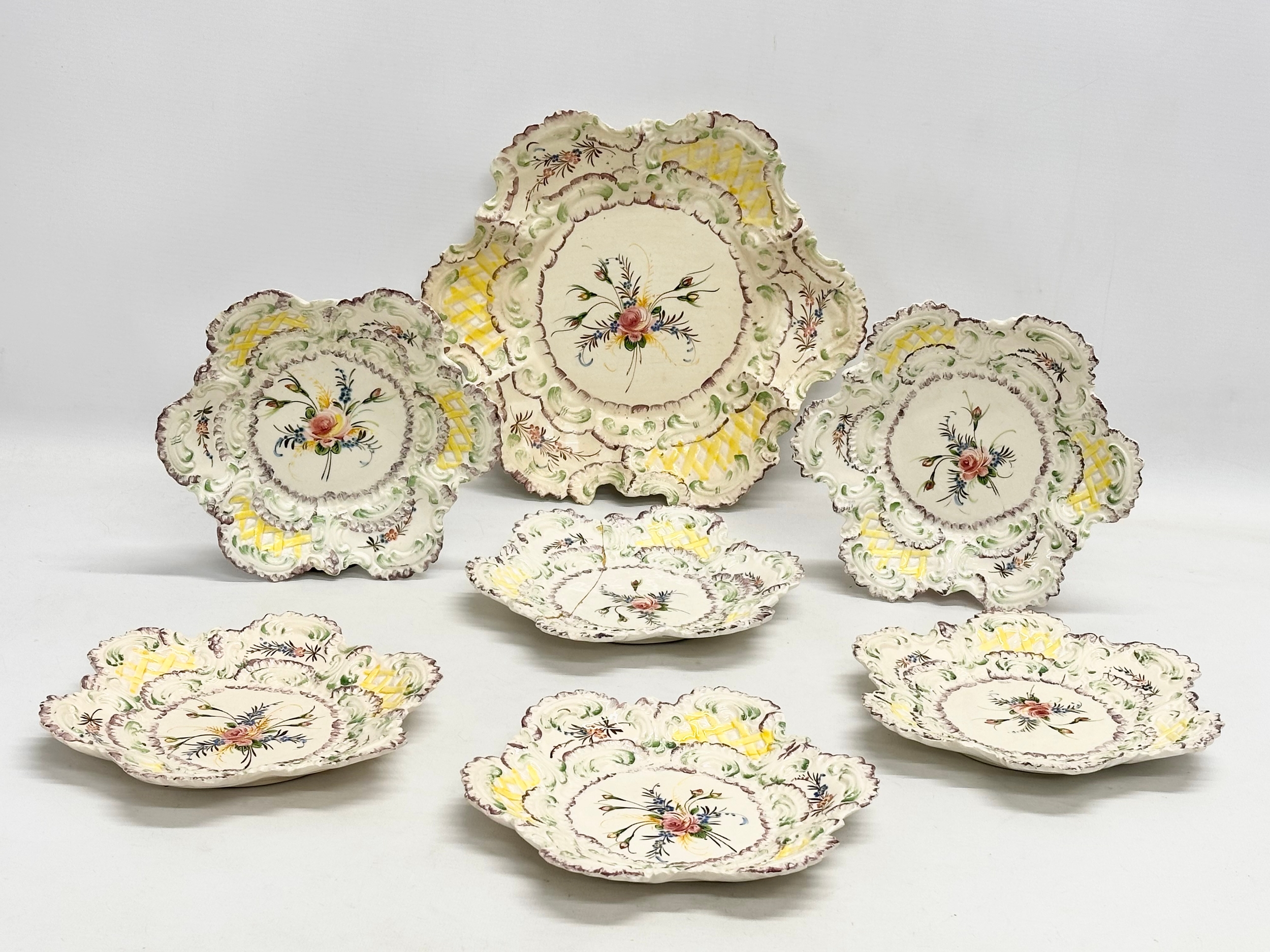 7 early 20th century Italian hand painted Majolica plates. Impressed Made in Italy. With makers