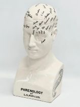 A large late 20th century Phrenology head in the manner of L.N. Fowler. 21x16x47cm