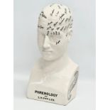 A large late 20th century Phrenology head in the manner of L.N. Fowler. 21x16x47cm