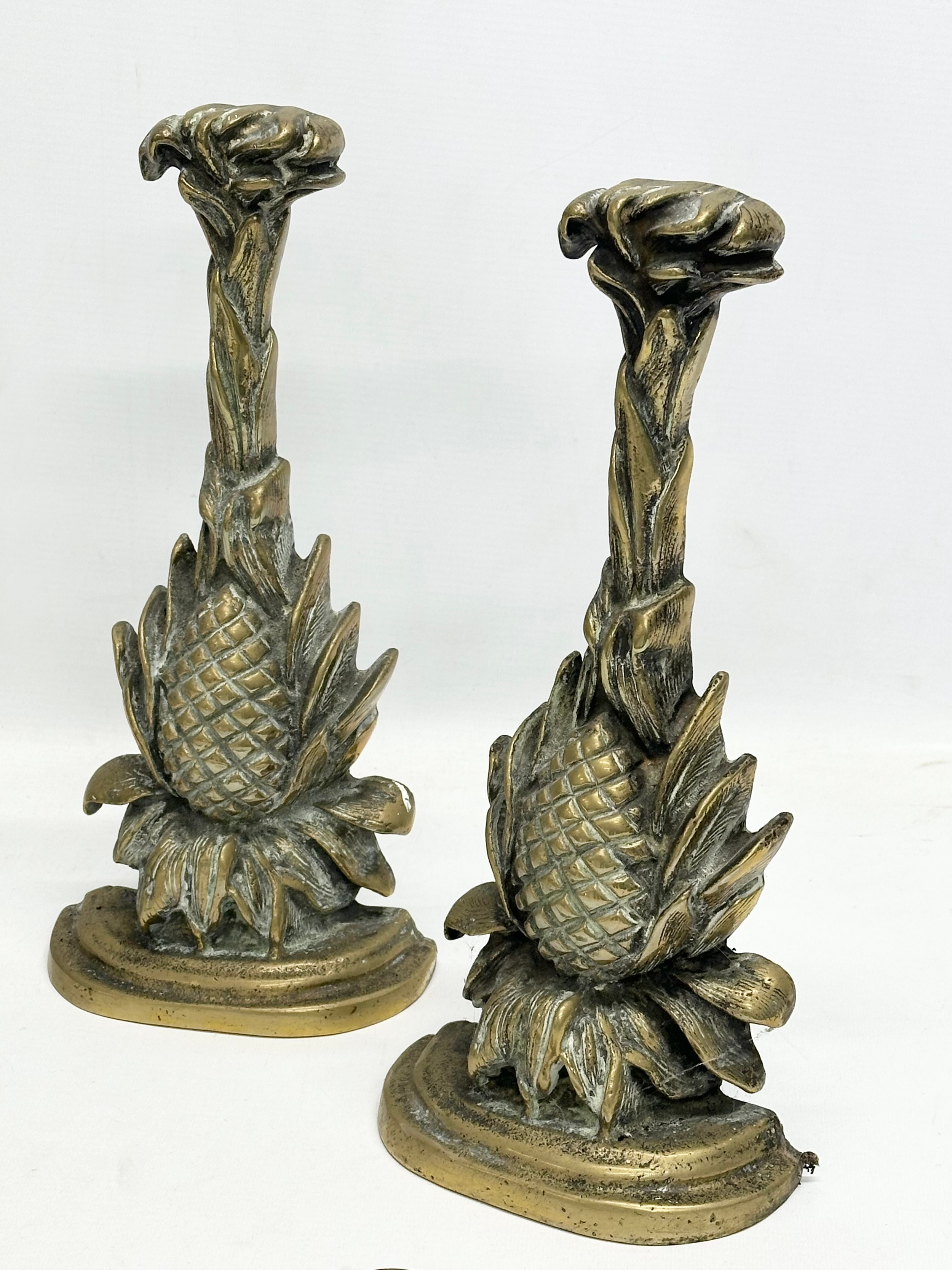 A quantity of Late Victorian brass fire tools and doorstops. A large Victorian brass companion set - Image 2 of 6