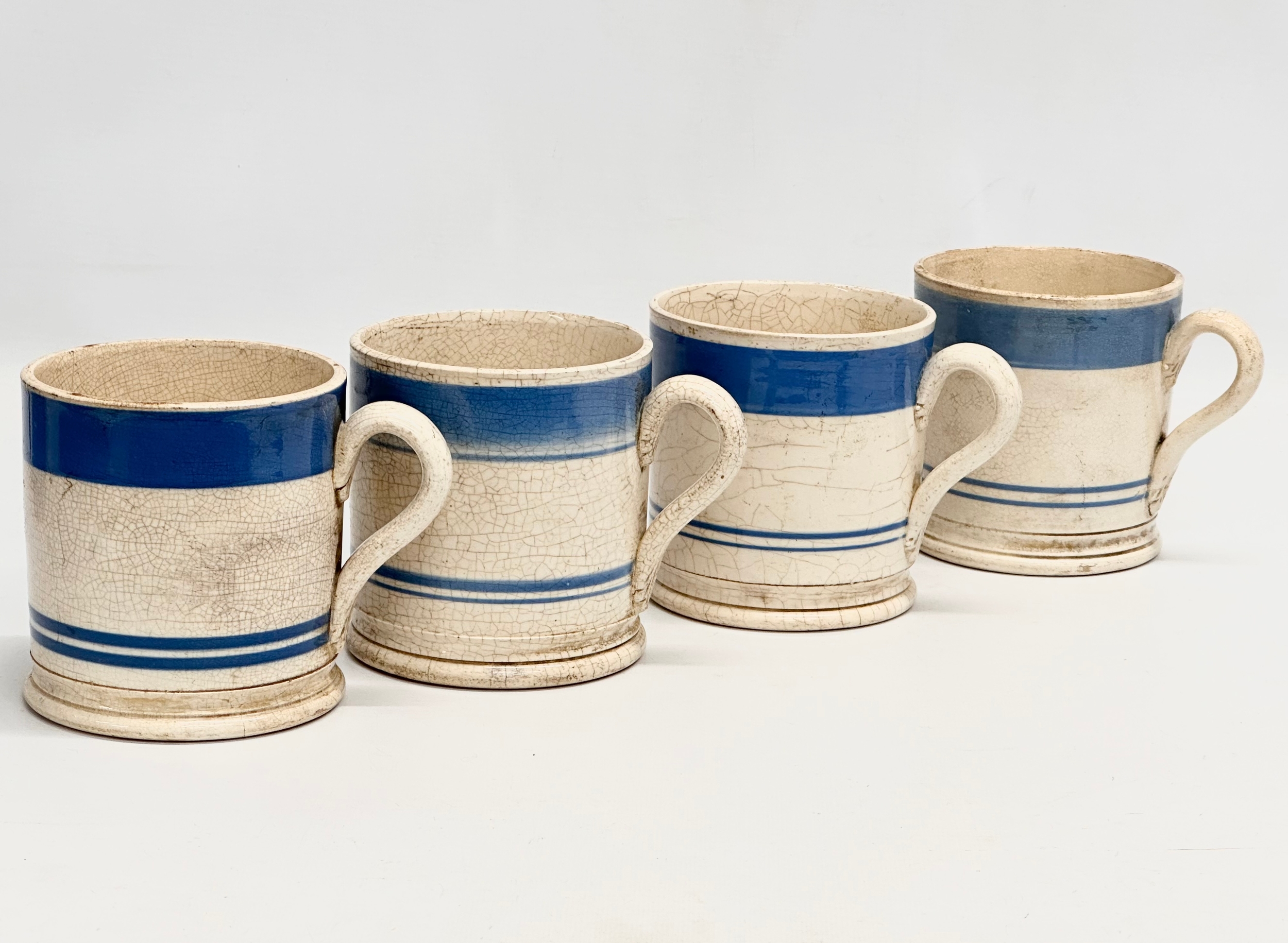 A collection of Mid 19th Century Victorian Mocha Ware mugs. Including a large Edwardian blue and - Bild 3 aus 10