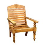A teak plantation chair.