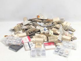 A large quantity of Early / Mid 20th Century cigarette cards, and international collector's coins.