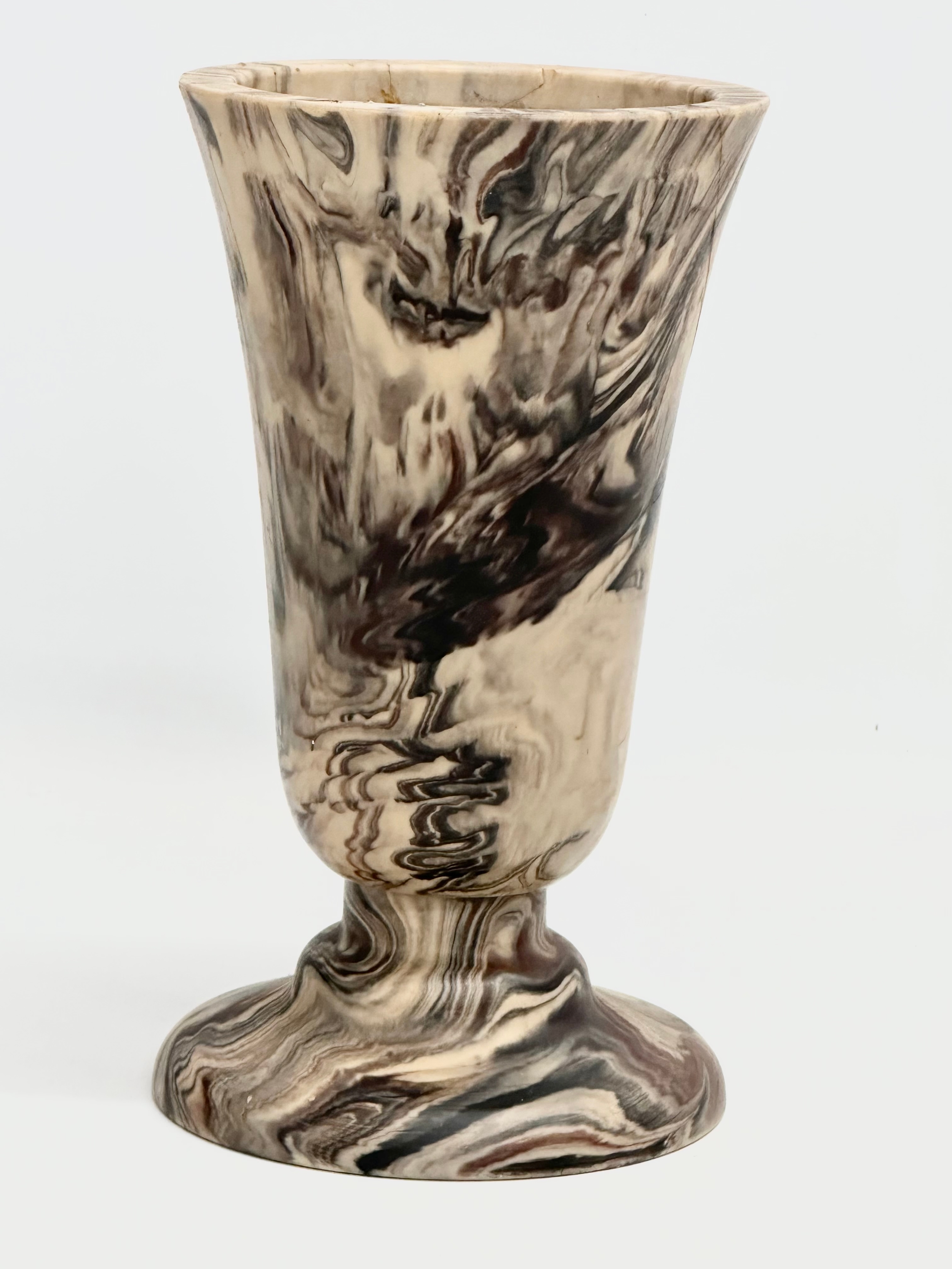 A marble vase. 13x23cm
