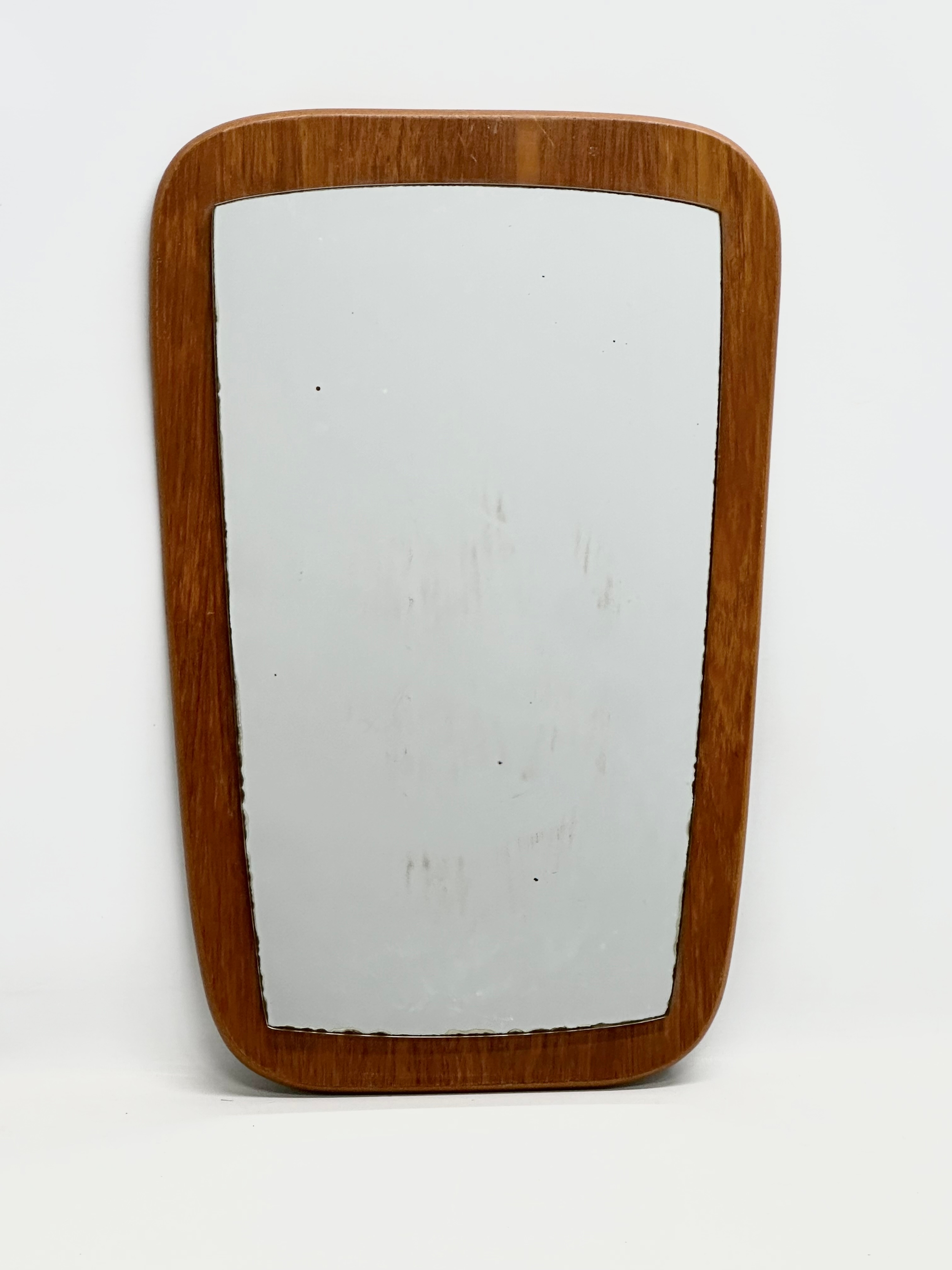 A Mid Century teak framed mirror. 38x60cm