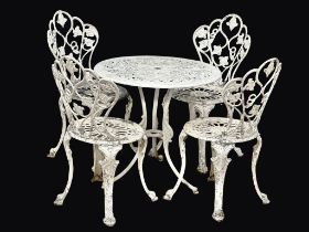 A 19th Century style cast alloy garden table and 4 chairs.