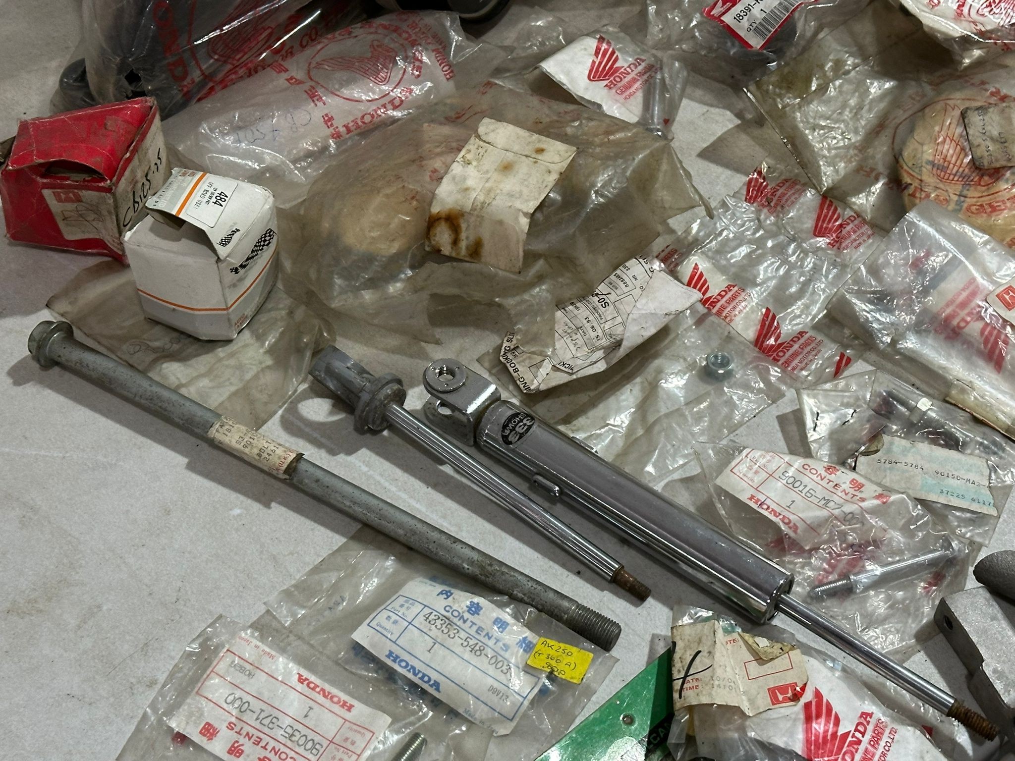 A large quantity of mostly old new stock genuine Honda parts. - Image 28 of 65