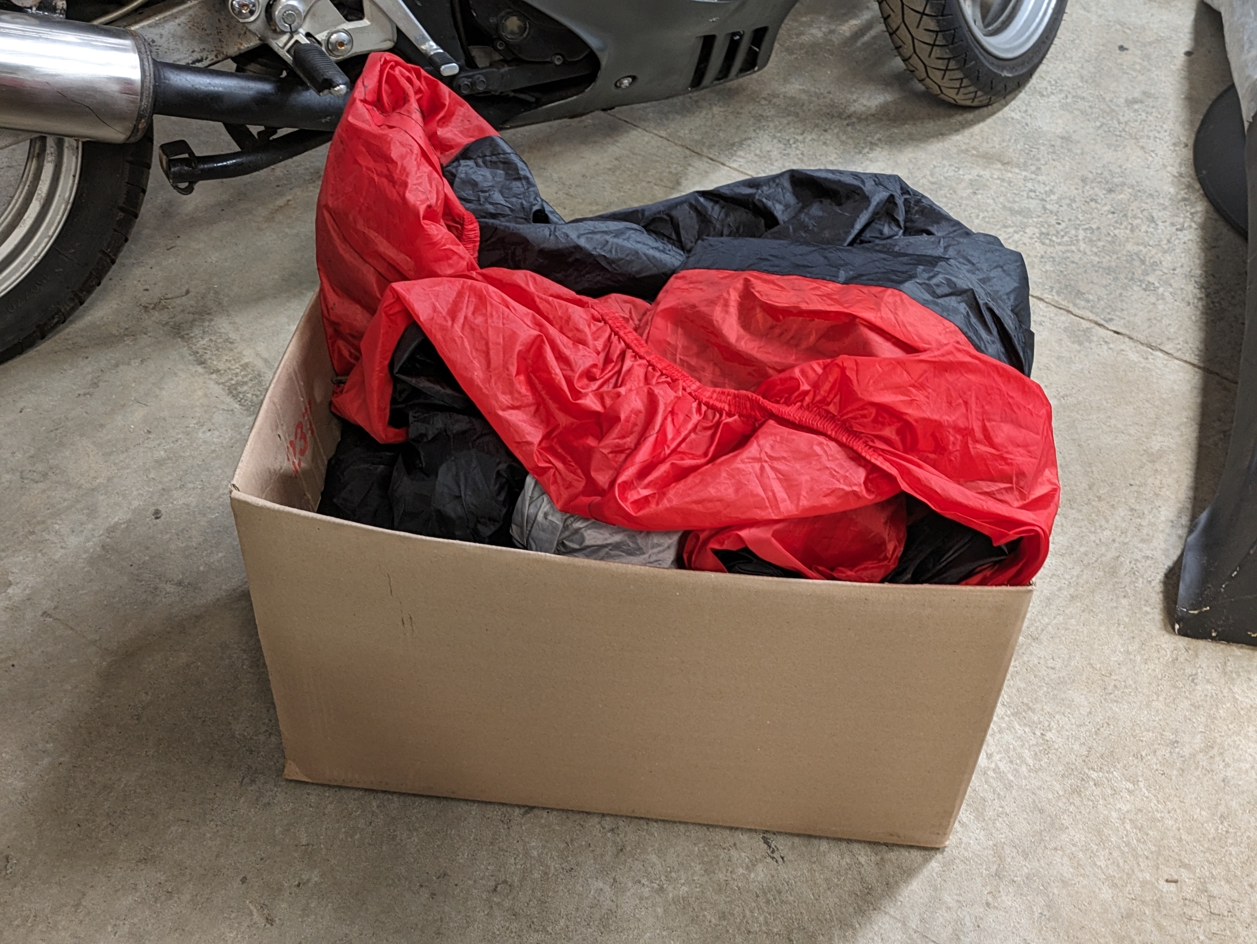A box of motorbike covers
