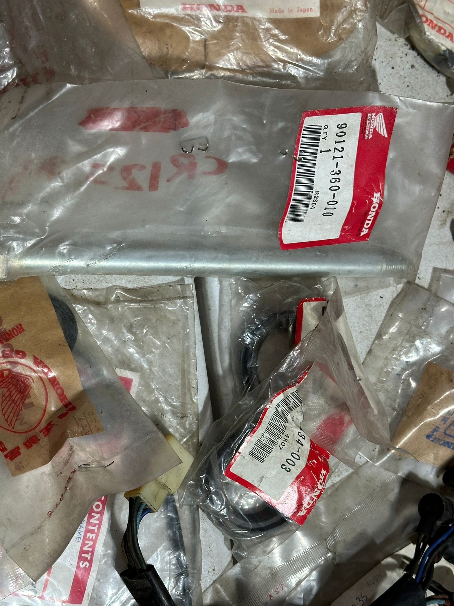 A large quantity of mostly old new stock genuine Honda parts. - Image 17 of 65