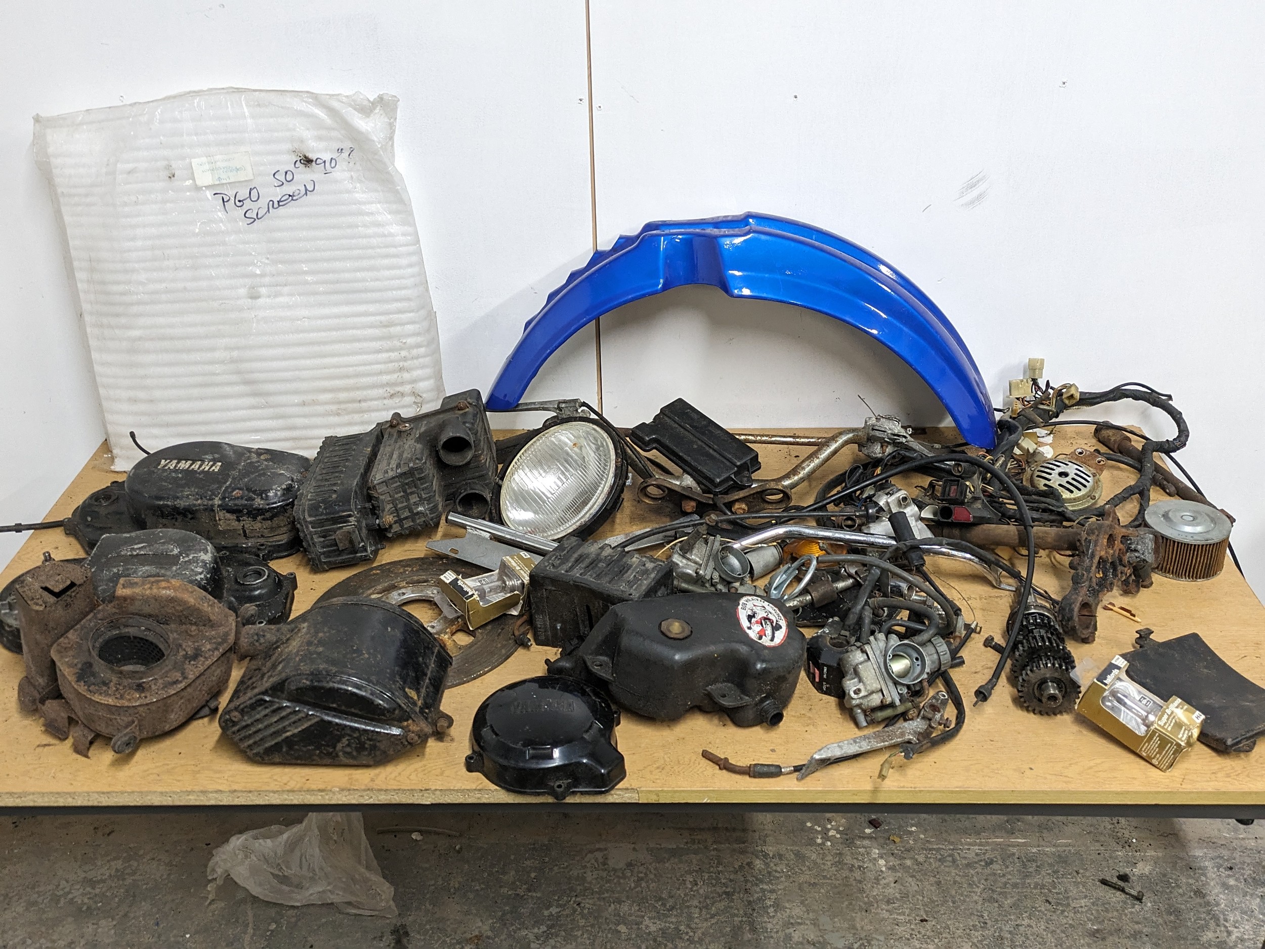 A collection of motorbike parts, Yamaha etc