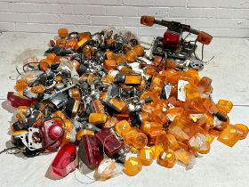 A large quantity of various motorbike indicators