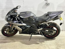 A 2004 Yamaha R1 Raven Edition, with key. Needs battery.