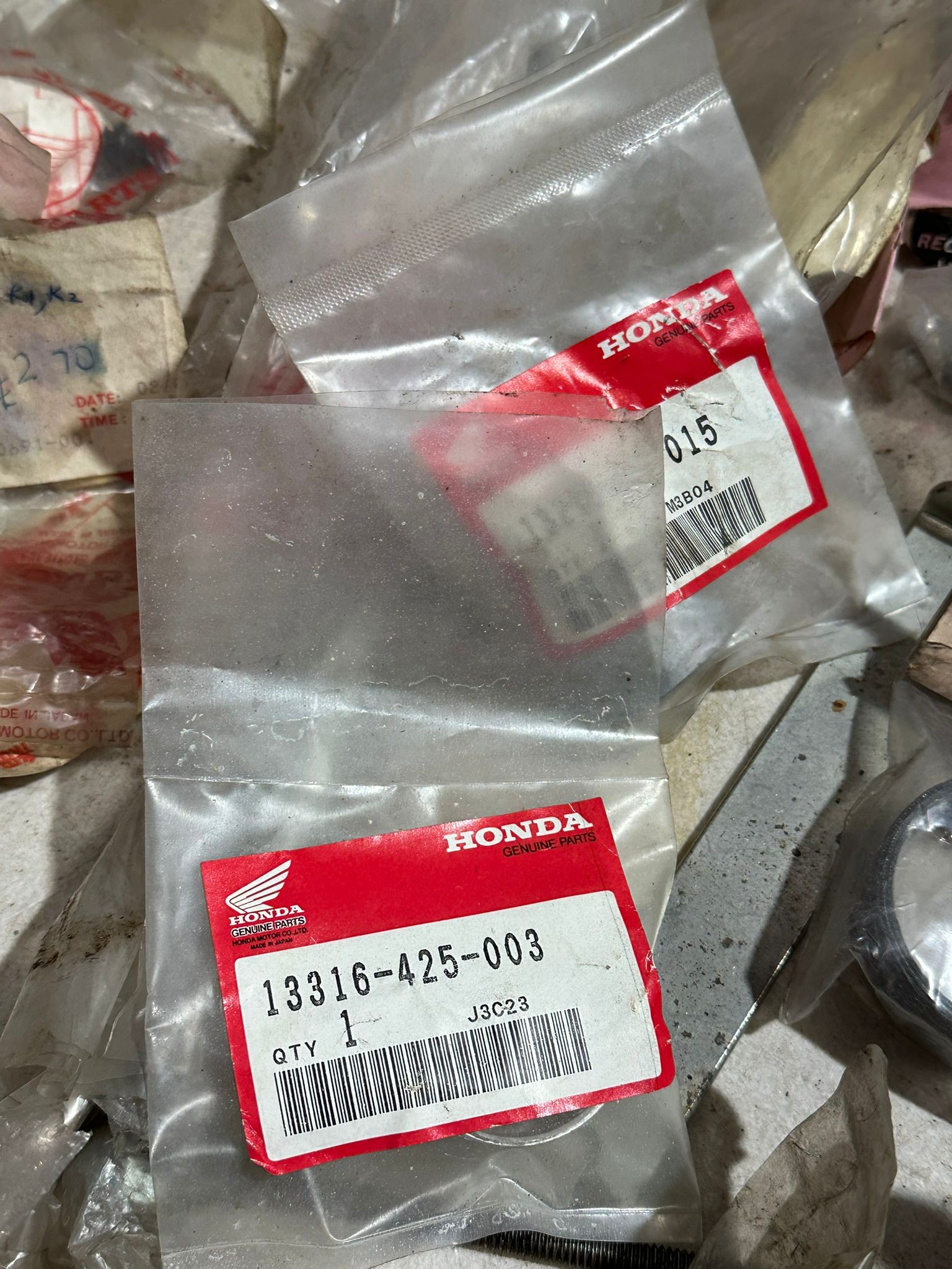 A large quantity of mostly old new stock genuine Honda parts. - Image 44 of 65
