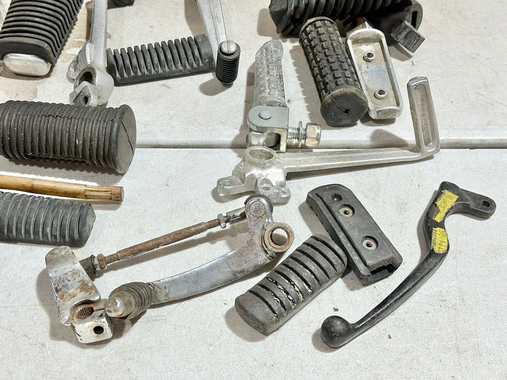 A sundry lot of various motorbike electrical parts with foot rests etc - Image 10 of 14