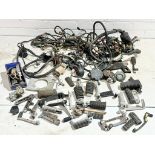 A sundry lot of various motorbike electrical parts with foot rests etc