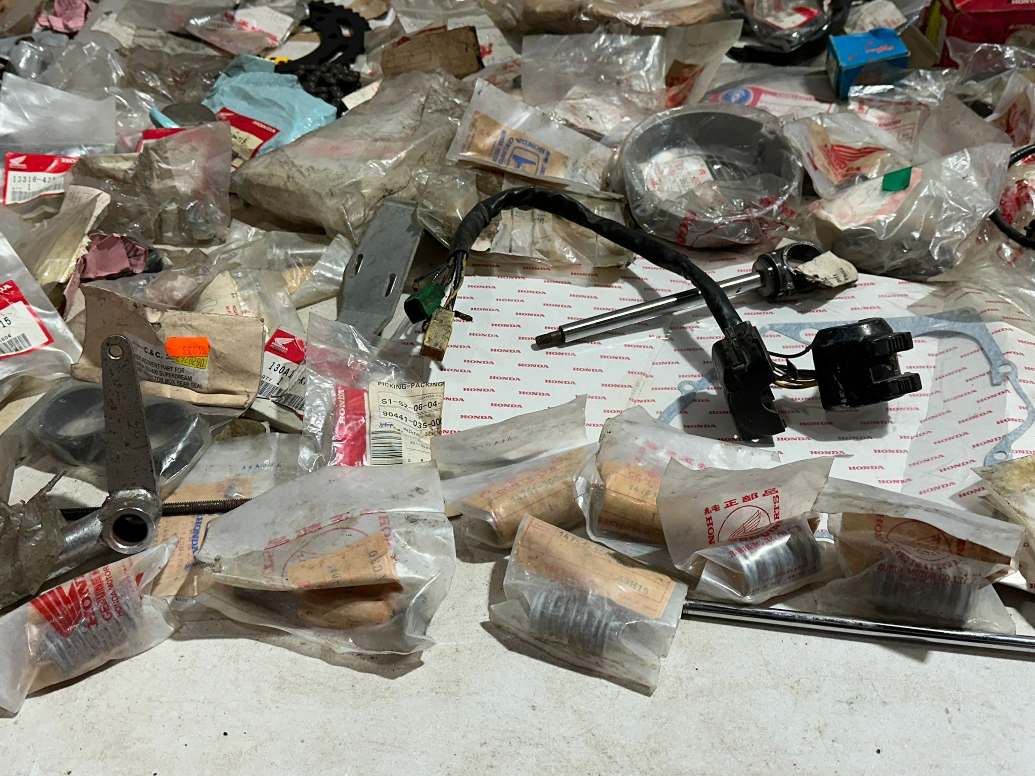 A large quantity of mostly old new stock genuine Honda parts. - Image 39 of 65